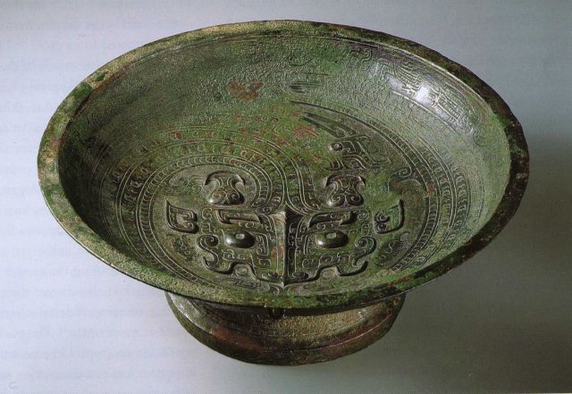 Pan with dragon-and-fish design